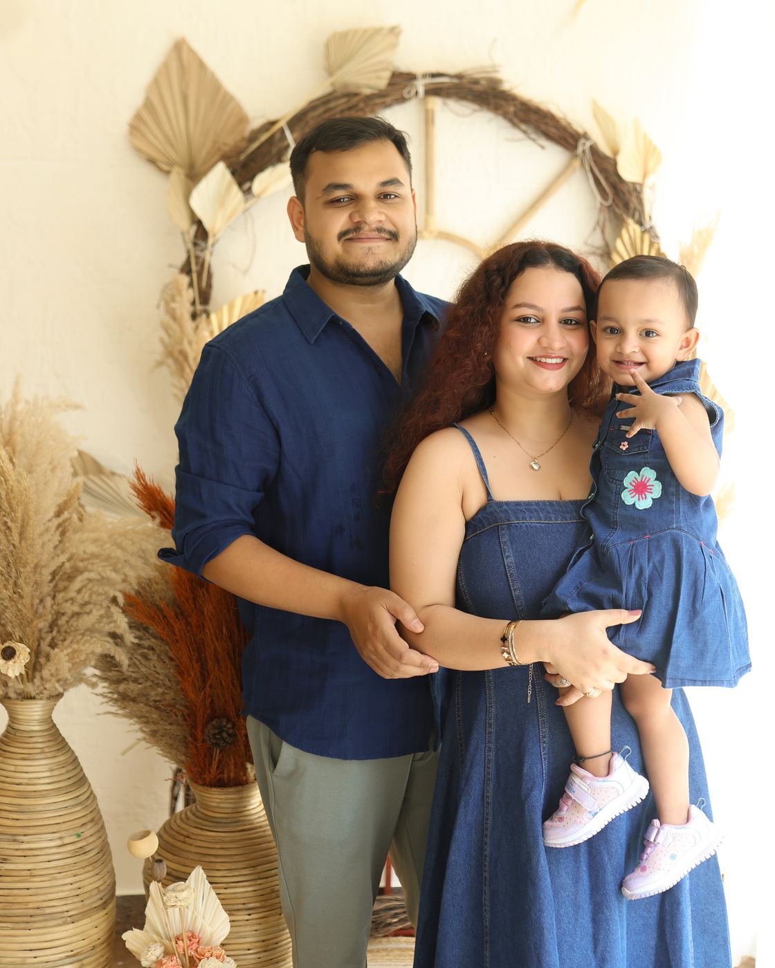 Family in blue on the boho setup